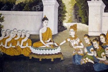 Fresko, joka kuvaa kohtausta Buddhan elämästä Wat Phra Doi Suthepissa Chiang Maissa. Buddha saa almua. Thaimaa