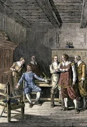 Yhdysvallat, Massachusetts: John Winthropin (1588-1649) ja Thomas Dudleyn (1576-1653) välinen kiista Massachusettsin lahden siirtokunnassa. Värikaiverrus 1800-luvulta.