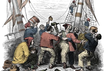 Merirosvot juhlivat rikkaan saaliin vangitsemista vihollisen aluksen hyökkäyksen jälkeen. Kaiverrus 1800-luvulta