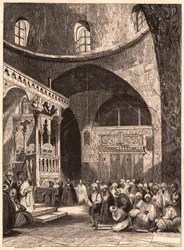 Rabbi ja seurakunta synagogassa Jerusalemissa