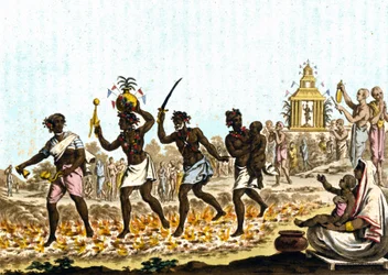 Intia. Fakiirit kävelemässä hehkuvilla hiilillä. 1800-luvun kaiverrus.