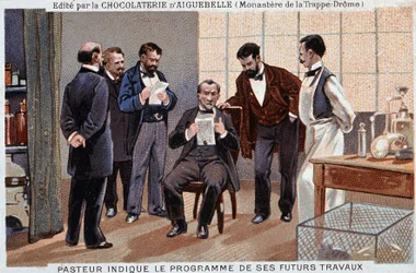 Louis Pasteur, ranskalainen tiedemies (1822-1895), ilmoitti tulevan työnsä ohjelman yhteistyökumppaneiden ympäröimänä - Aiguebellen suklaamainosmerkki, v. 1895.