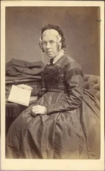 Nainen kirjan kanssa, n. 1860 (valokuva)