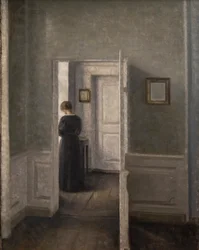 Sisustus, jossa nainen seisoo (öljy kankaalle)